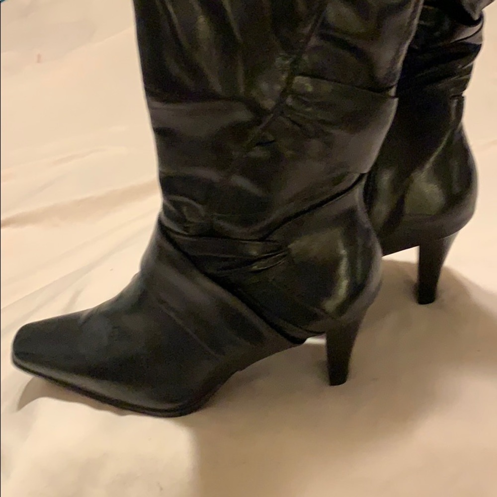 Knee high boots. NEW